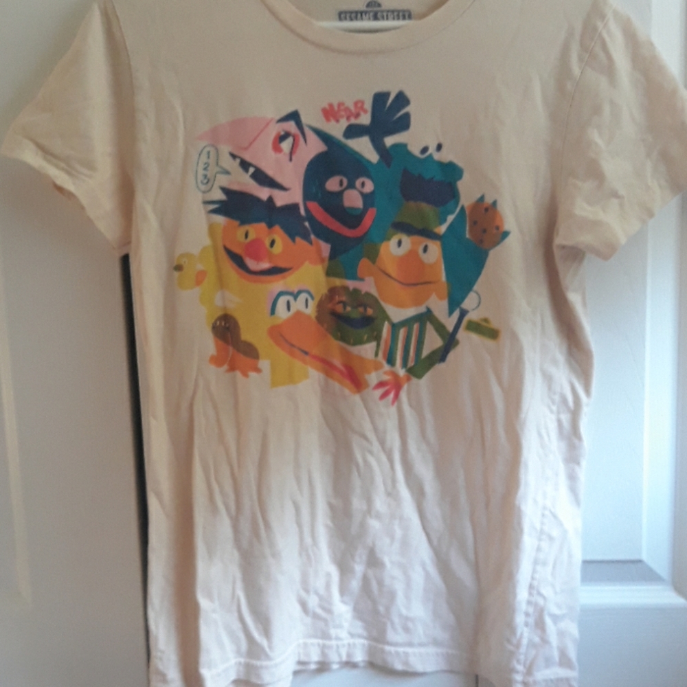 Cream colored Sesame Street shirt